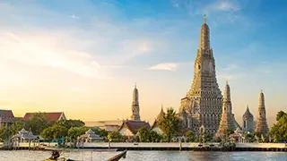 Wat Arun beside the Chao Phraya River in Bangkok, Thailand