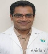 Dr. Madan Ballal