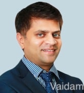 Dr. Dinesh M G