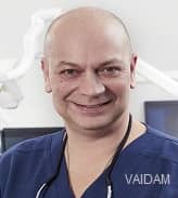 Dr. Can Tokman
