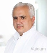 Dr. Akin Akakin