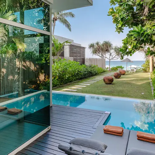 Aleenta Phuket Grand Deluxe Pool Villa outdoor living pool and daybed on Natai Beach Phang Nga