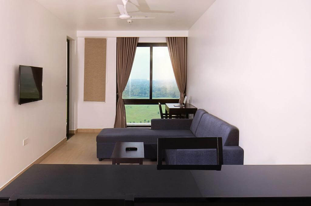 Well-maintained, comfortable patient room with serene surroundings at Sanjeevanam
