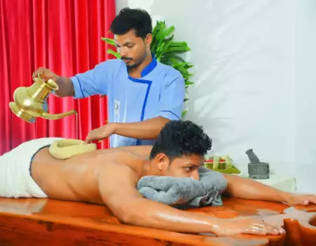 Ayurvedic spine treatment session at Focuz AyurCentre orthopaedic clinic Kerala