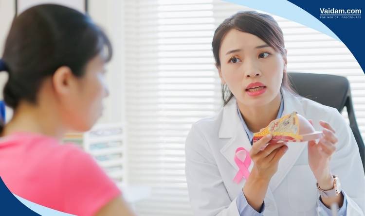 Doctor explaining about breast cancer to the patient