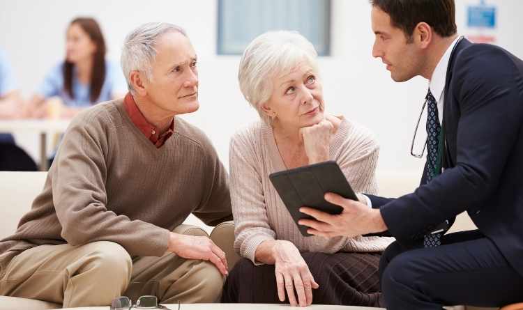 Old age people consulting case manager for knee replacement