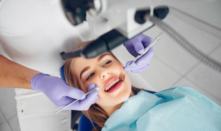 Denstist Performing Dental Treatment