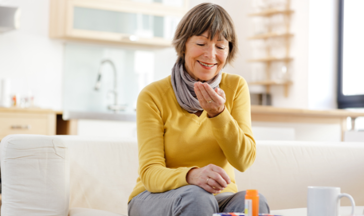 Lady taking pills